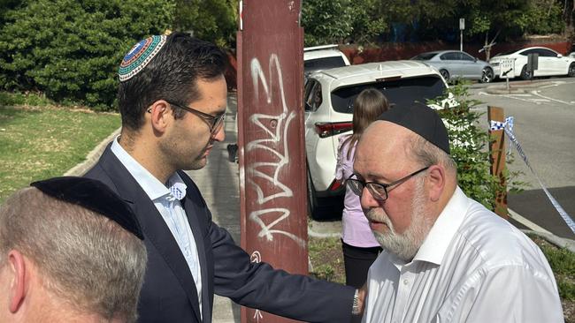 The Adass Israel Synagogue, an ultra orthodox synagogue in Ripponlea, was attacked about 4am on Friday December 6. Josh Burns speaking with members of the community. Picture: Mohammad Alfares