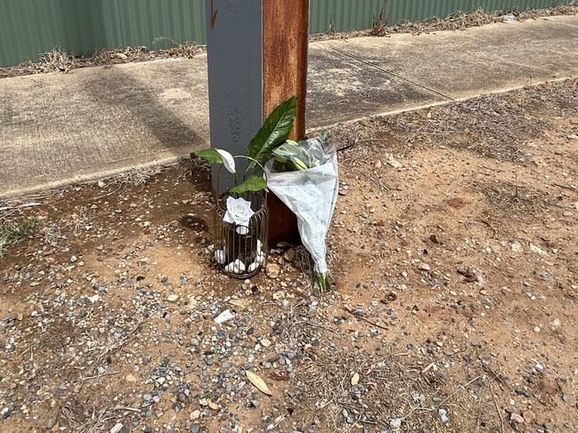 Flowers left at the scene of a fatal crash at Queenstown overnight . Picture: Natalie Vikhrov