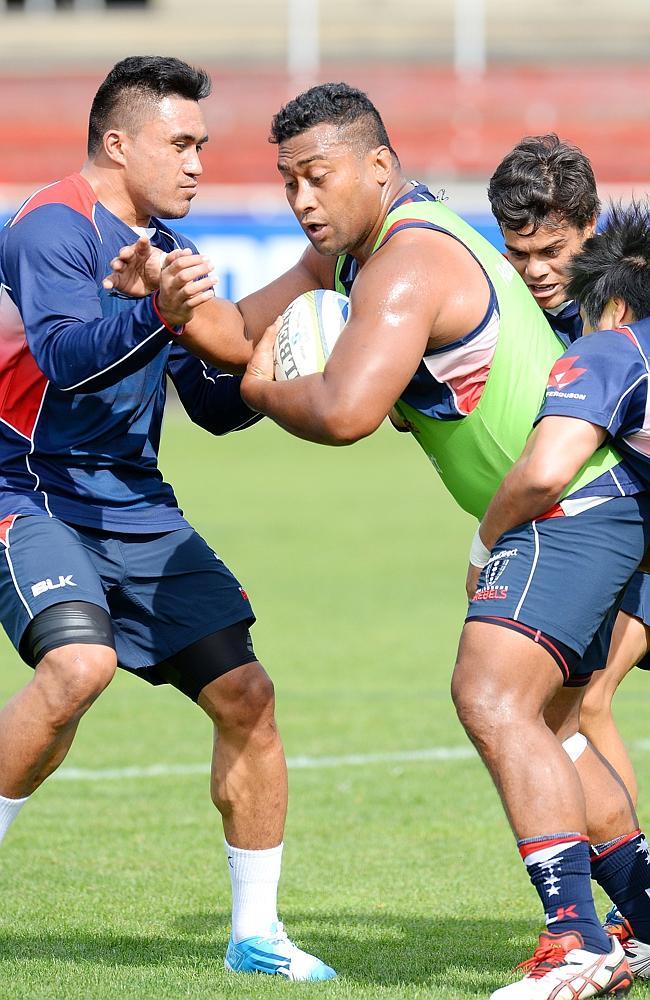 Male Sau (L) in action at a Rebels training session. Picture: Josie Hayden