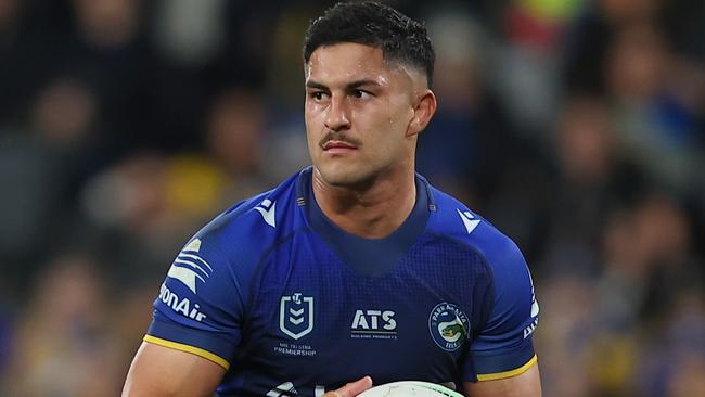 SYDNEY, AUSTRALIA - AUGUST 09: Dylan Brown of the Eels looks to pass during the round 23 NRL match between Parramatta Eels and Penrith Panthers at CommBank Stadium, on August 09, 2024, in Sydney, Australia. (Photo by Jeremy Ng/Getty Images)