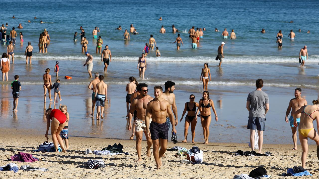 Beachgoers pictured at Bondi Beach enjoying the water and sun this week. Picture: Matrix News