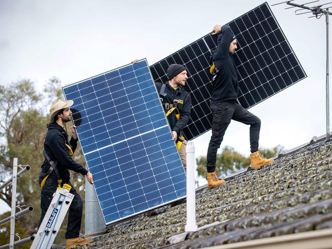 Chris Bowen is relying on solar panels and wind turbines to bring prices down. Picture: Mark Stewart