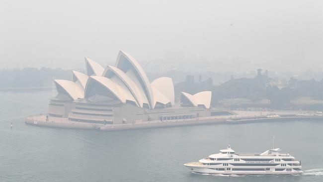 Smoke haze is seen over Sydney Harbour with the Opera House hardly visible earlier this week. Picture: Getty Images