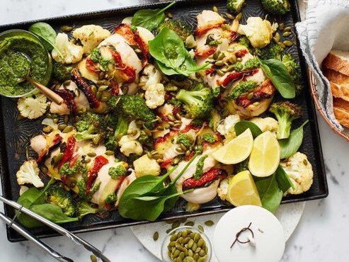 Hasselback chicken with lemon-roasted broccoli.