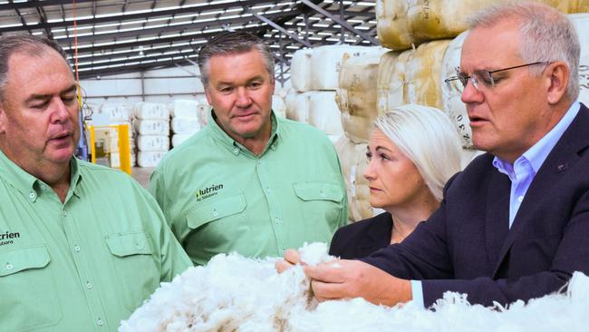 Nutrien Ag Solutions GM John Tuskin and state wool manager Stewart Raine with Liberal candidate for Lyons Suzie Bower and Prime Minister Scott Morrison at Nutrien's Evandale wool storage facility. Picture: Alex Treacy