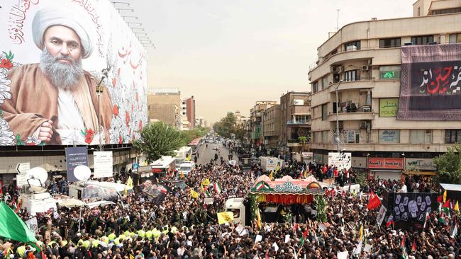 Iranians take part in a funeral ceremony for late Hamas leader Ismail Haniyeh, in Tehran. Picture: AFP.