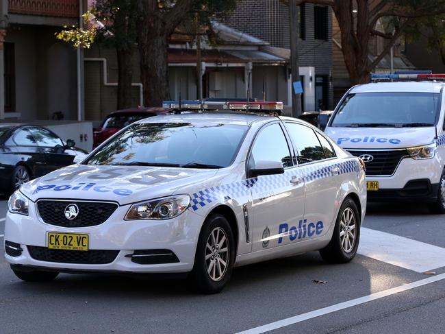 SYDNEY, AUSTRALIA - NewsWire Photos SEPTEMBER 14, 2020: Police officers from South Sydney Police Area Command are pictured on scene at Erskineville Housing Estate where a 57 year old man died following an assault on Swanson Street, Erskineville. A 28 year old man was arrest several hours later and taken to Mascot Police Station. Picture: NCA NewsWire / Nicholas Eagar