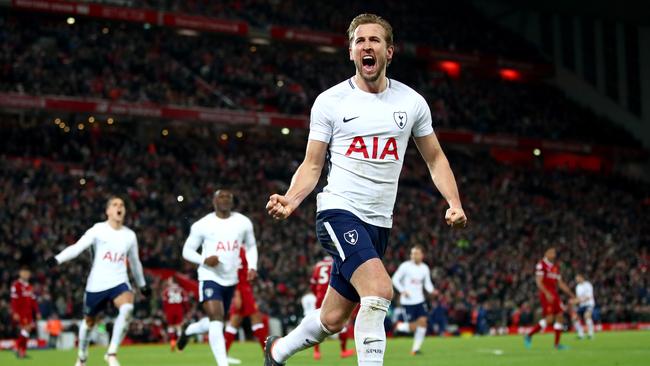 LIVERPOOL, ENGLAND - FEBRUARY 04: Harry Kane of Tottenham Hotspur celebrates after scoring his sides second goal and his 100th Premier League goal during the Premier League match between Liverpool and Tottenham Hotspur at Anfield on February 4, 2018 in Liverpool, England. (Photo by Clive Brunskill/Getty Images)