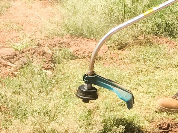 Darius Sherrin learning to use a whipper snipper at Yirara College. Picture: SUPPLIED