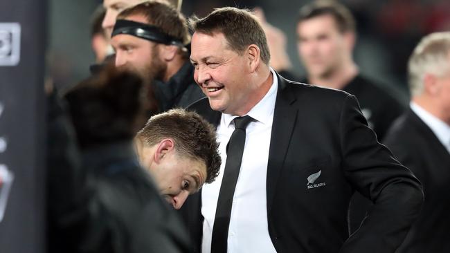 New Zealand coach Steve Hansen talks to his players at Eden Park in Auckland.