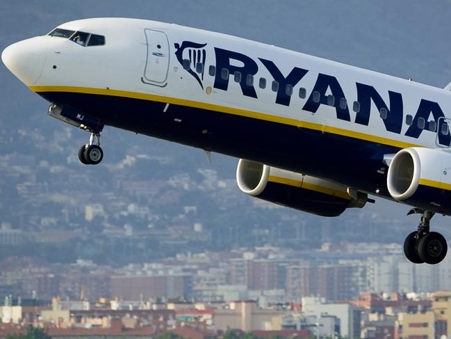 (FILES) In a file picture taken on September 1, 2010 an airplane of the Irish low-cost airline Ryanair takes off from Barcelona's airport. Irish airline Ryanair's first-half net profits soared by nearly 40 percent on keen demand, the strong pound, fuel savings and poor weather conditions in northern Europe, it said on November 2, 2015. AFP PHOTO / JOSEP LAGO