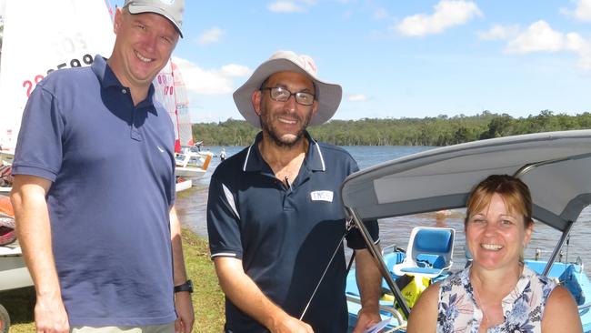 Tinaroo Sailing Club commodore Michael Formosa of Goldsborough Valley (centre) with Yachting Queensland president Matthew Johnson and Australian Sailing Queensland club service officer Alison Turner. Picture: David Anthony