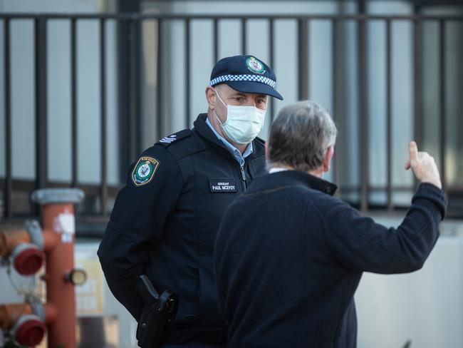 Police are guarding the building. Picture: Julian Andrews