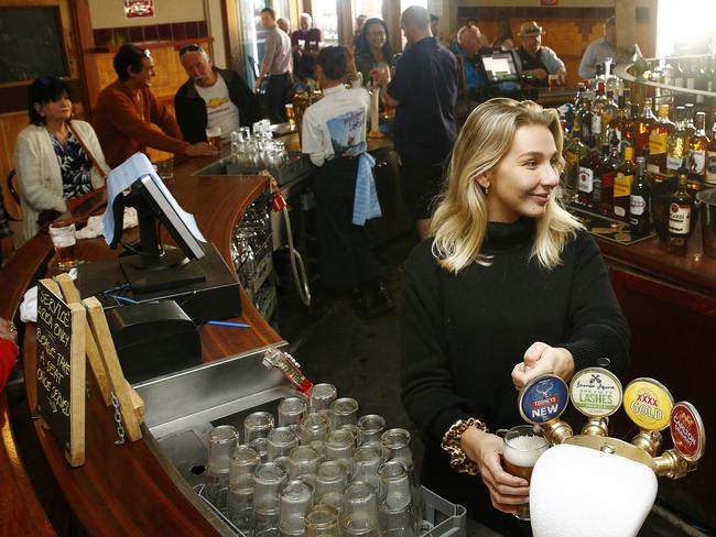 Manager Shelby Doyle at work behind the Round bar. Hotel Steyne in Manly following the lifting of restrictions. Picture: John Appleyard