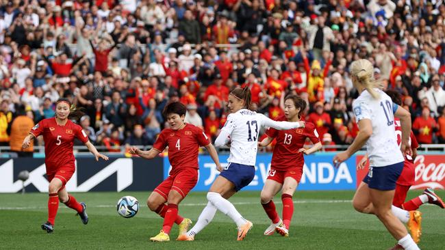 Alex Morgan of USA tries to shoot after her penalty