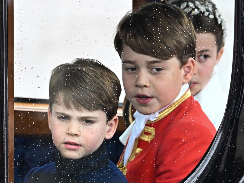 The future of the British monarchy: Louis, George and Charlotte. Picture: Oli SCARFF / AFP