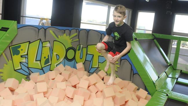 Riley Hutson enjoys Flip Out Trampoline Arena.