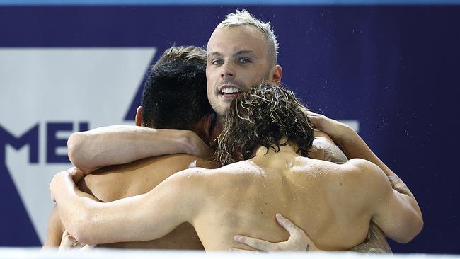 Kyle Chalmers, Isaac Cooper, Joshua Yong and Matthew Temple celebrate winning gold. Photo by Daniel Pockett/Getty Images.