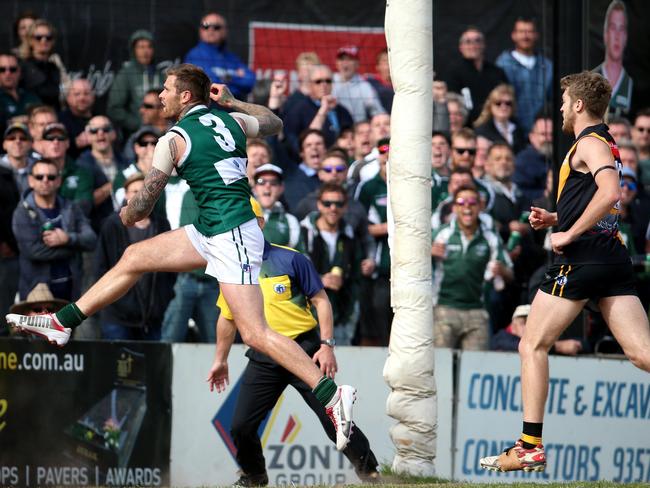 Luke Stanton of Greensborough kicks a goal during the 2014 NFL Division 1 grand final. Picture: Mark Dadswell