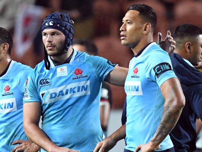 Michael Wells of the Waratahs (left) has pledged to step up mentally and physically against the Reds on Saturday night.