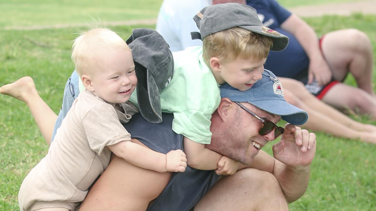 Matt , Reuben and Theo Hornby among the crowd at the 2025 Gold Coast Open surf comp at Burleigh Heads. Picture: Glenn Campbell