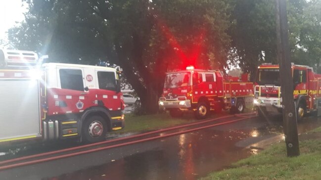 Firefighters at the scene of the Christmas Day horror.