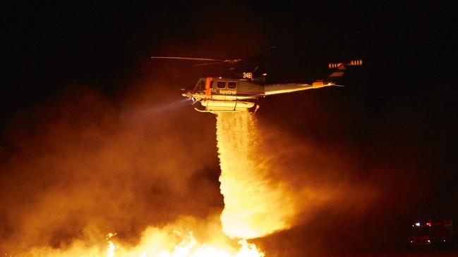 A Kestrel Aviation Bell 412 fights a controlled blaze.