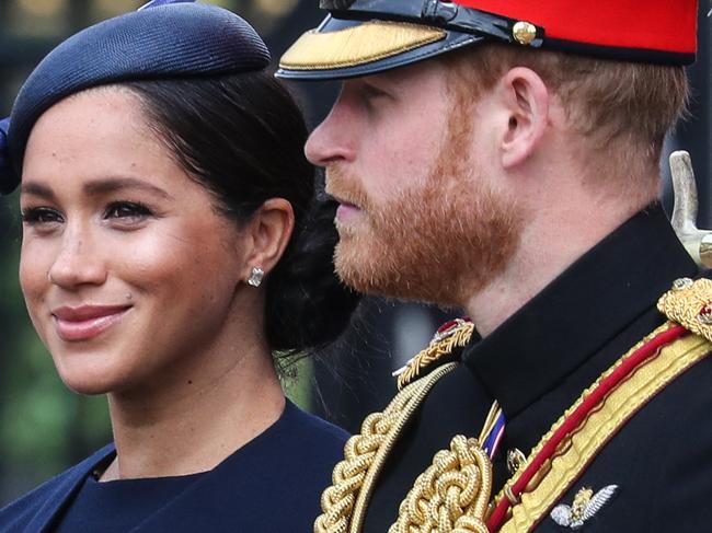 NON-EXCLUSIVE PICTURE: MATRIXPICTURES.CO.UK PLEASE CREDIT ALL USES  WORLD RIGHTS  Prince Harry, Duke of Sussex and Meghan, Duchess of Sussex ride by carriage down the Mall during the Trooping The Colour, the Queen's annual birthday parade in London.  The Queen will then take her salute at a fly-past of the Royal Air Force from the balcony at Buckingham Palace.  The ceremony of Trooping the Colour is believed to have first been performed during the reign of King Charles II.   Since 1748, the Trooping of the Colour has marked the official birthday of the British Sovereign.   Over 1400 parading soldiers, almost 300 horses and 400 musicians take part in the event.   JUNE 8th 2019  REF: JRD 192105