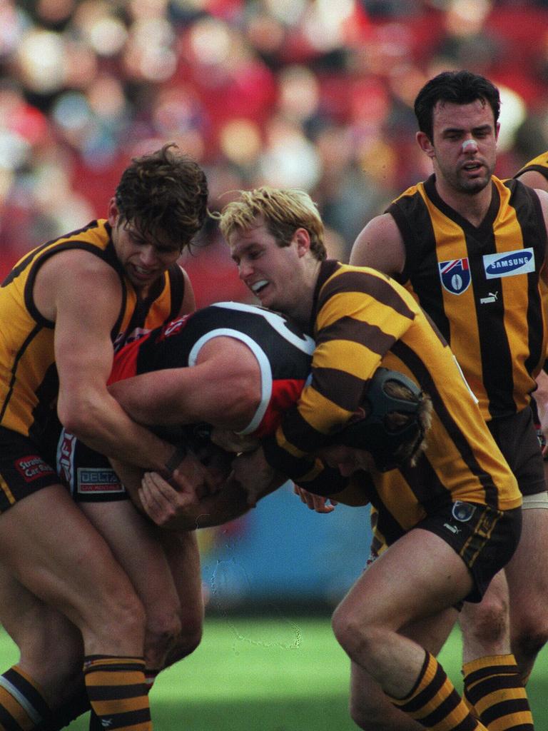 Justin Crawford in action for the Hawks against St Kilda at Waverley Park in 1998.