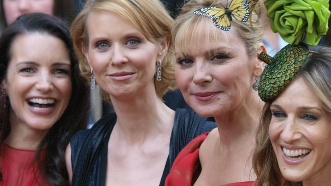 13/05/2008 WIRE: (From L to R) US actresses Kristin Davis, Cynthia Nixon, Kim Catrall, and Sarah Jessica Parker pose for the photographers after arriving in London's Leicester Square on May 12, 2008, to attend the World Premiere of their latest film, Sex and the City. The film is an adaptation for the big screen of the TV series. AFP PHOTO/Max Nash