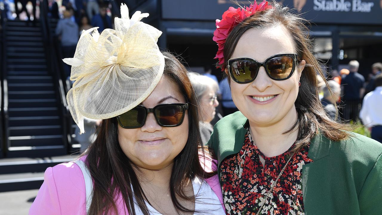 Caulfield Guineas horse race meeting, Caulfield, Victoria, Saturday 12th October 2024. Faces in the crowd. Pictured enjoying the race meeting are Kris and Tanya. Picture: Andrew Batsch