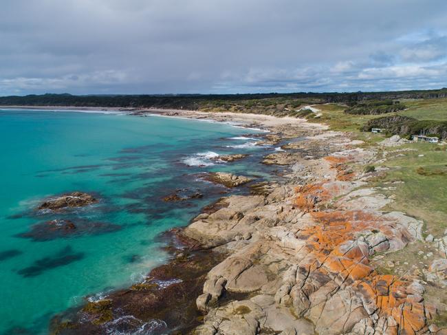 One of the island’s best surfing spots Martha Lavinia Beach. Picture: Stu Gibson/Tourism Tasmania.