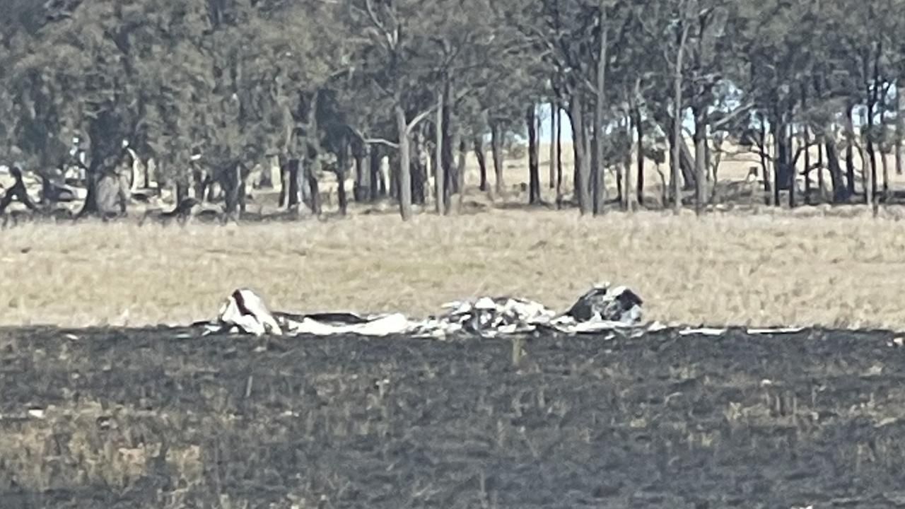 Police on the scene after a light aircraft crashed in the Southern Downs, north of Warwick shortly after midday.