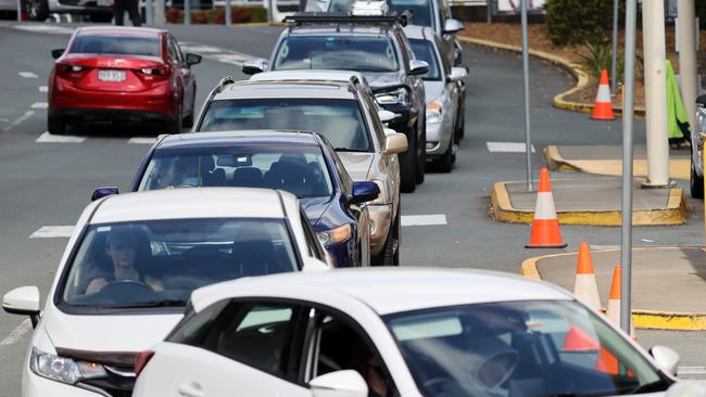 People queue up to be tested at Kenmore for Covid-19. Picture: NIGEL HALLETT