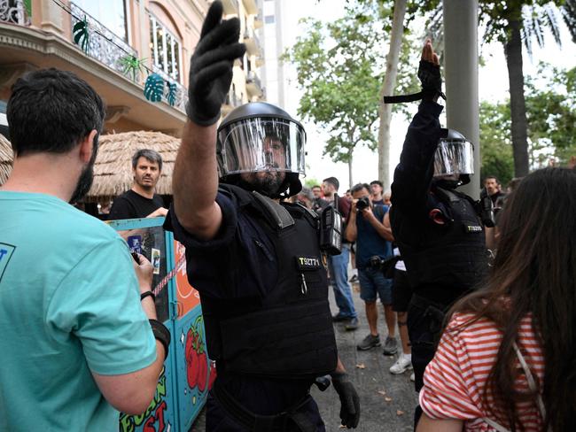 DFAT has warned protesters could clash with police. Picture: AFP