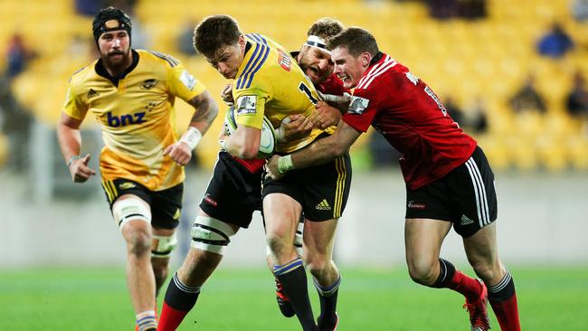 Beauden Barrett of the Hurricanes left the field under an injury cloud.