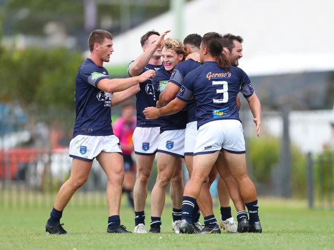 Newcastle celebrate try by Timanu Alexander. Picture: Sue Graham