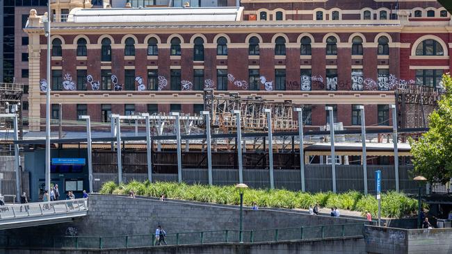 The ugly tags plastered along the Southbank side of Flinders Street Station. Picture: Jason Edwards