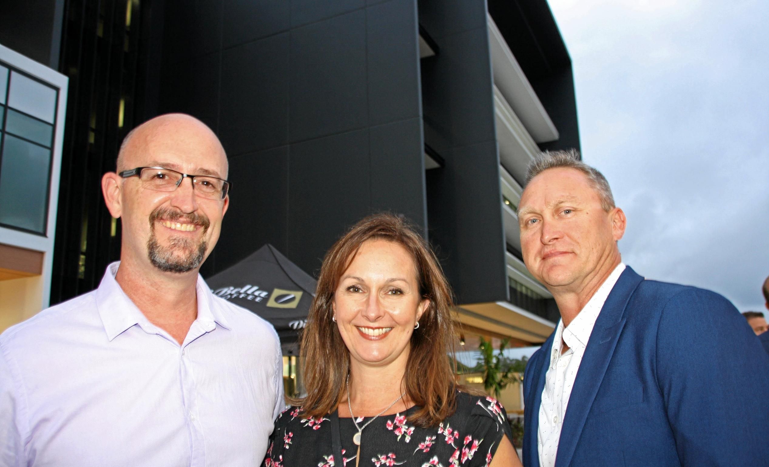 ?Conrad Kellow of Gecko Painting with Peta Russell and Dave Hungerford of Hutchinson Builders at the new Youi headquarters, Sippy Downs. Picture: Erle Levey