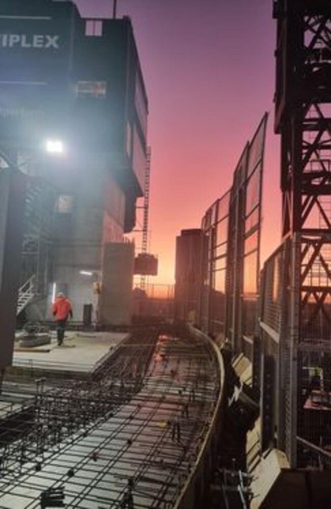 Though the extremely chilly start came with a wonderful sunrise, as Joe captured from the Queen's Wharf construction site this morning. Picture: Joe Cochran