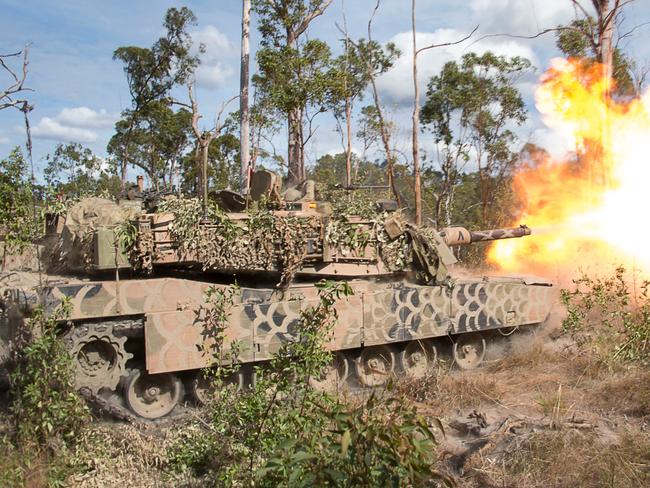 An Australian Army 1st Armoured Regiment M1A1 Abrams tank fires a 120mm round from its main gun in a Support By Fire serial during the Warfiighter activity at Shoalwater Bay Training Area, QLD. *** Local Caption *** Battle Group Lion’s four-week Warfighter exercise has culminated with an impressive display of live-fire action at Shoalwater Bay Training Area, 1 June to 3 July 2019. Led by the 1st Armoured Regiment, the Warfighter involved more than 900 personnel from across Australia including, cavalry, infantry, engineers, artillery, advanced medical and logistics support. The exercise incorporated dry and blank firing at the Combat Team level before working up to the three-day live fire activity, culminating in a combined arms Battle Group attack on the Lemon Tree Complex. The activity confirmed the Battle Group’s ability to provide agile Combat Teams in support of the 1st Brigade as it prepares to assume responsibility as Army’s READY brigade from 1 October 2019. Battle Group Lion’s four-week Warfighter exercise has culminated with an impressive display of live fire action at Shoalwater Bay Training Area, 1 June to 3 July 2019.