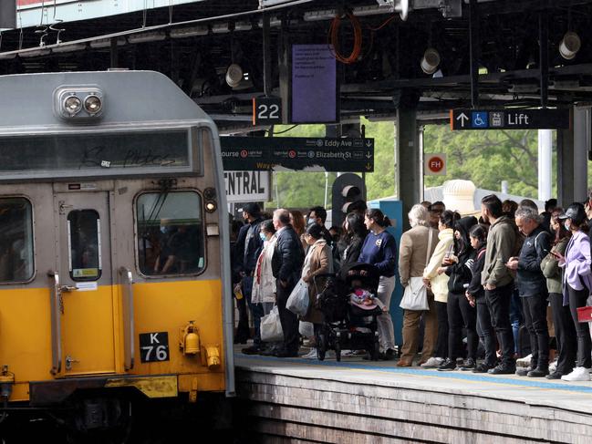 SYDNEY, AUSTRALIA - NewsWire Photos AUGUST 31, 2022: People packed onto platform 22 at Central Station as they wait for a train. Industrial union action is causing delays and less trains on the train and bus networks.Picture: NCA NewsWire / Damian Shaw