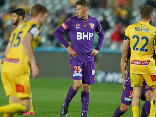 GOSFORD, AUSTRALIA - JULY 18: Kristian Popovic of Perth Glory reacts to a missed penalty during the round 29 A-League match between the Perth Glory and the Central Coast Mariners at Central Coast Stadium on July 18, 2020 in Gosford, Australia. (Photo by Ashley Feder/Getty Images)