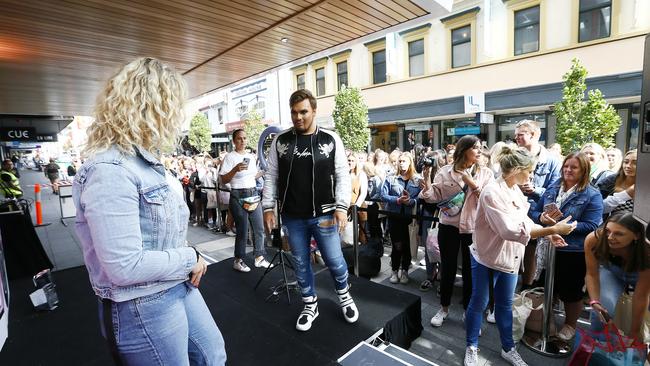 YouTube makeup guru Michael Finch with fans outside Myer in Hobart this morning. Picture: MATT THOMPSON