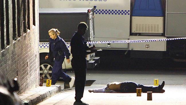 Police at the scene after Bandido gang boss Rodney Monk was shot in East Sydney.