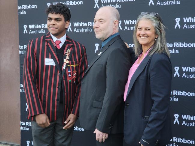 Global leader in the prevention of gendered violence Jackson Katz at a White Ribbon function on Making Women’s Safety a Men’s Issue Too with a student from Aquinas College and Communicare chief executive officer Melissa Perry. Picture: Supplied