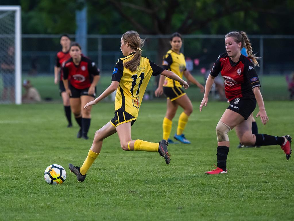 Edge Hill United's Tully Heatley runs the ball hard downfield in Saturdays FNQ Premier League Grand final between Edge Hill United and Leichhardt at Endeavour Park. Picture: Emily Barker