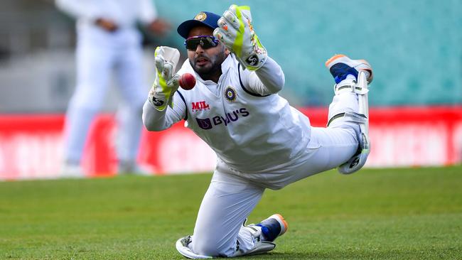 India's wicketkeeper Rishabh Pant drops a gloved hook shot from Will Pucovski Picture: AFP