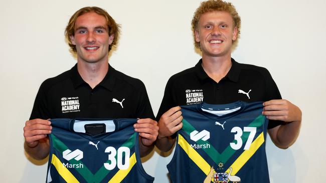 Matt LeRay (right) with Central District teammate Dyson Sharp after they were presented with their Australian guernseys before the AFL National Academy’s clash against Richmond’s VFL team. Picture: Josh Chadwick/AFL Photos/via Getty Images