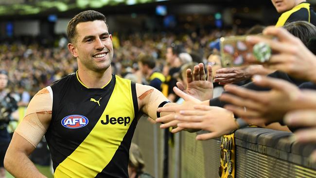 Jack Graham celebrates the preliminary final win with Tiger fans.